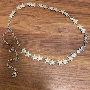 Chain Adjustable Waist Belt with Silver Tone Star Design.